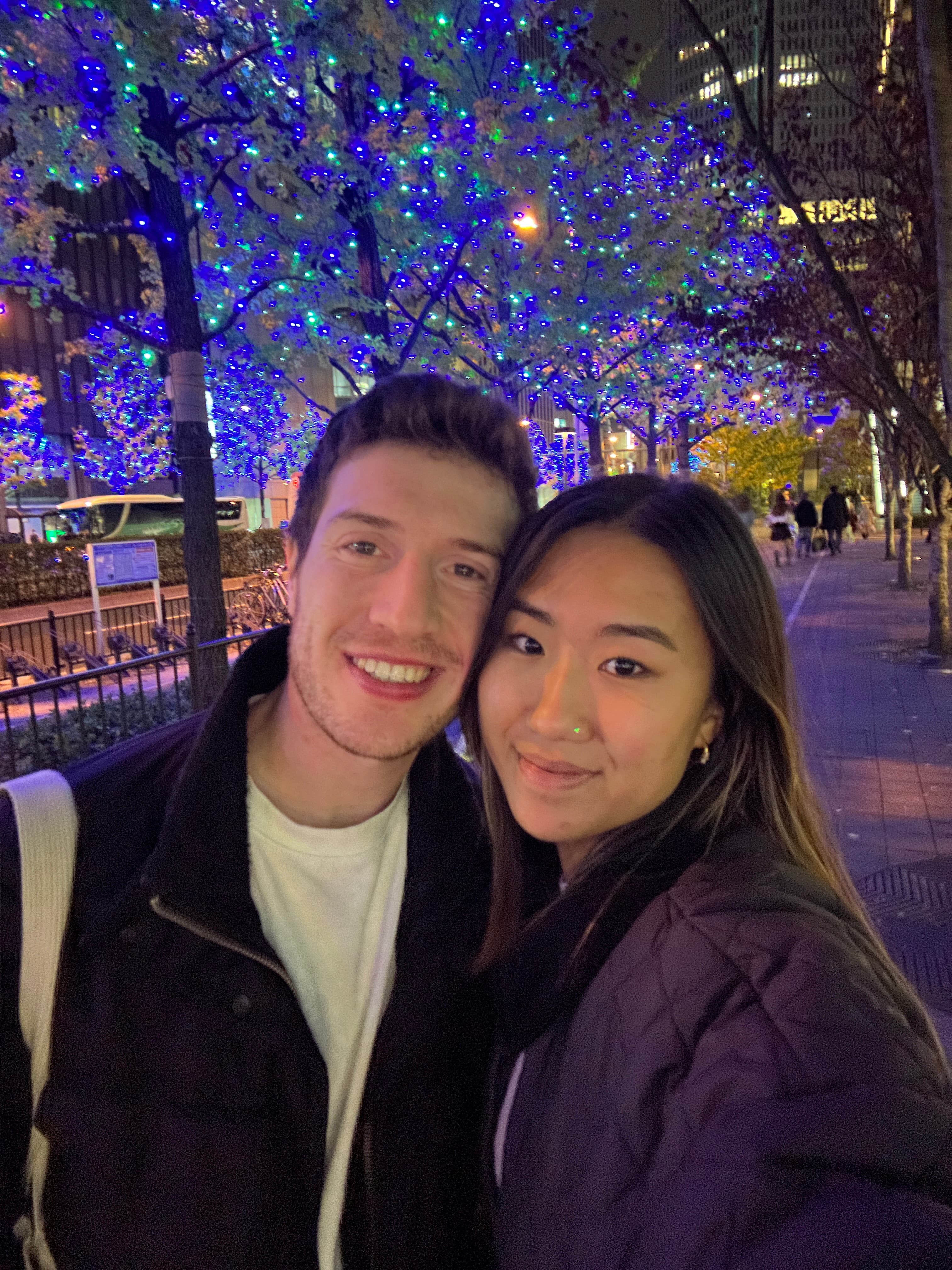 Emily and Daniel under blue lights